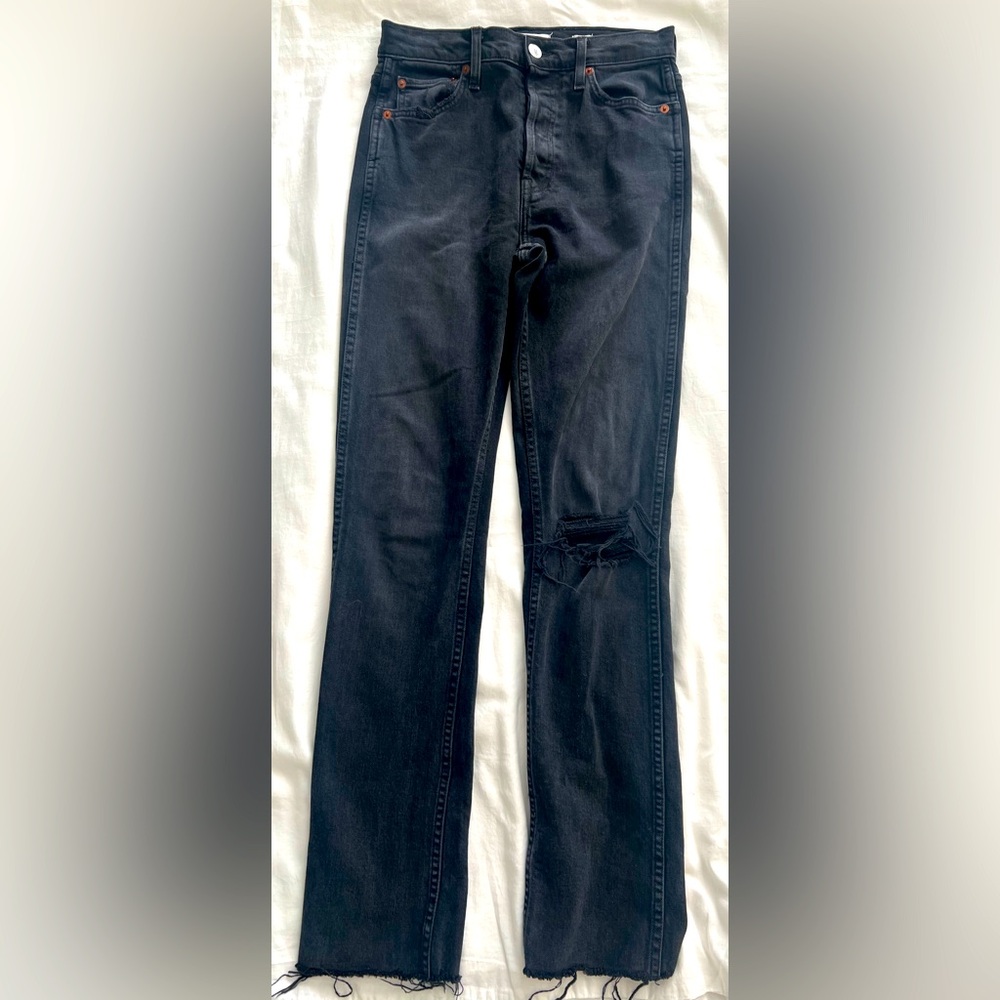 Re/Done black original stretch, high waisted jeans with worn knees. Wm size 26